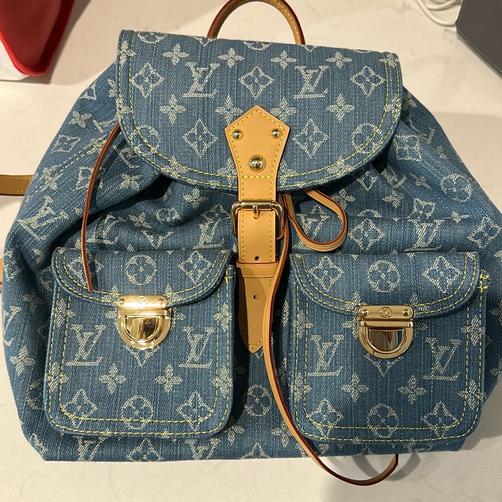 Blue and tan backpack LV style